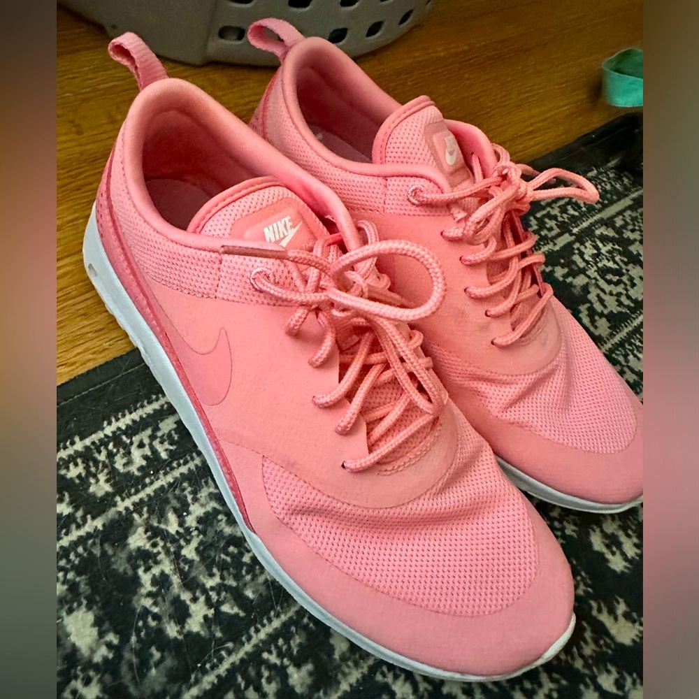 Pink coral Nike tennis shoes Thea